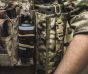 close-upo-of-navy-seals-style-elastic-gear-retainers-on-a-spray-bottle