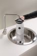 fidlock-hydration-bladder-being-filled-by-a-tap
