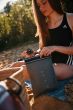fidlock-dry-bag-mega-in-use-on-a-beach
