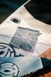 fidlock-dry-bag-mega-fabric-grey-on-surfboard