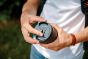 fidlock-lens-cap-clip-attached-to-camera