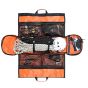 splayed-open-view-of-the-kong-bag-with-orange-sections-and-mesh-pockets-with-other-transparent-pockets,-another-example-of-items-inside-it,-this-time-a-rope-and-helmet-across-the-midsection