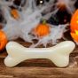 sodapup-glow-in-the-dark-bone-not-lit-up,-natural-colour-with-a-halloween-background