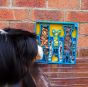 SodaPup-Waiting-Dogs-Design-Etray-Blue-Outlines-of-three-dogs-the-tray-is-stood-up-against-a-wall-and-a-dog-is-looking-at-it
